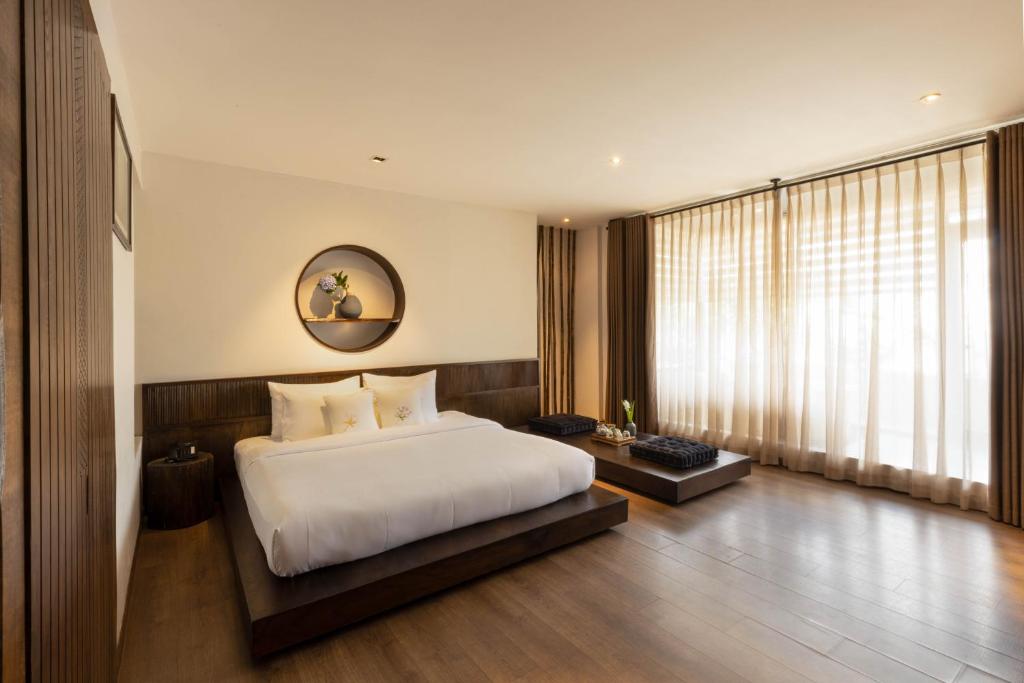 Suite Cochin Signature bao gồm bữa sáng nổi và minibar miễn phí