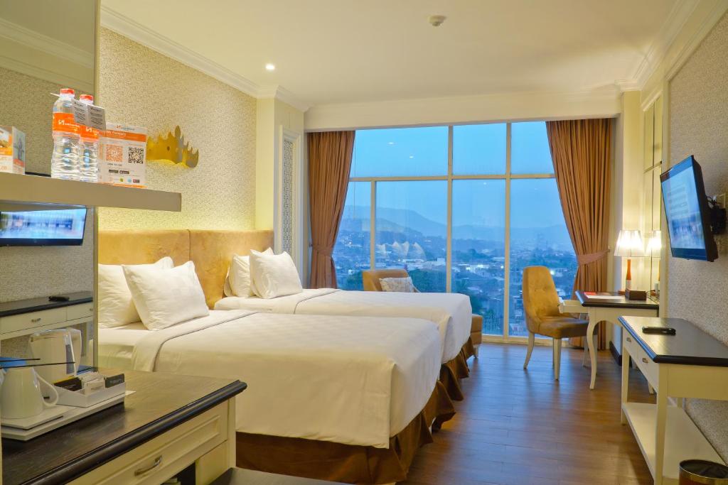 TV a/nebo společenská místnost v ubytování Swiss-Belhotel Lampung
