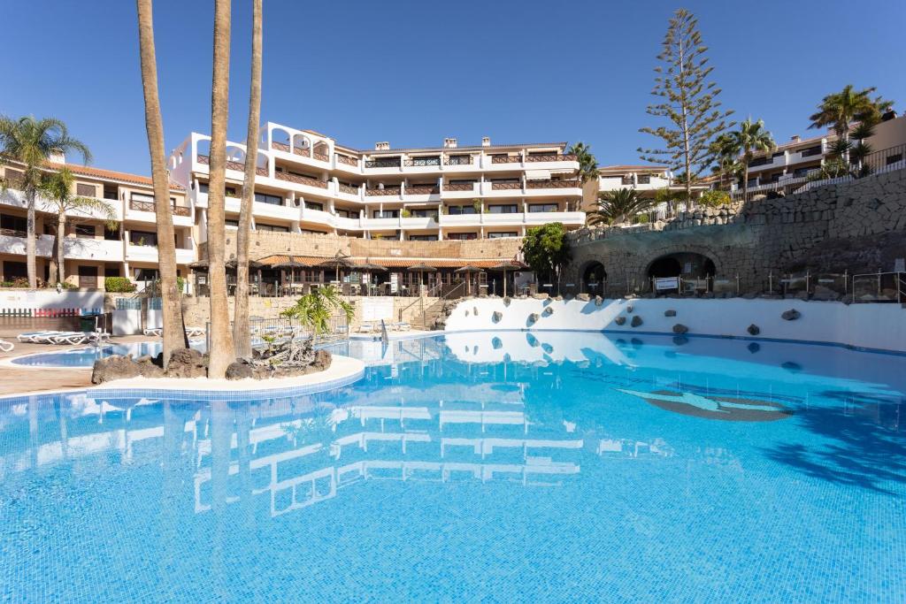 Bazén v ubytování Oceanfront Tenerife South Albatros 125 nebo v jeho okolí