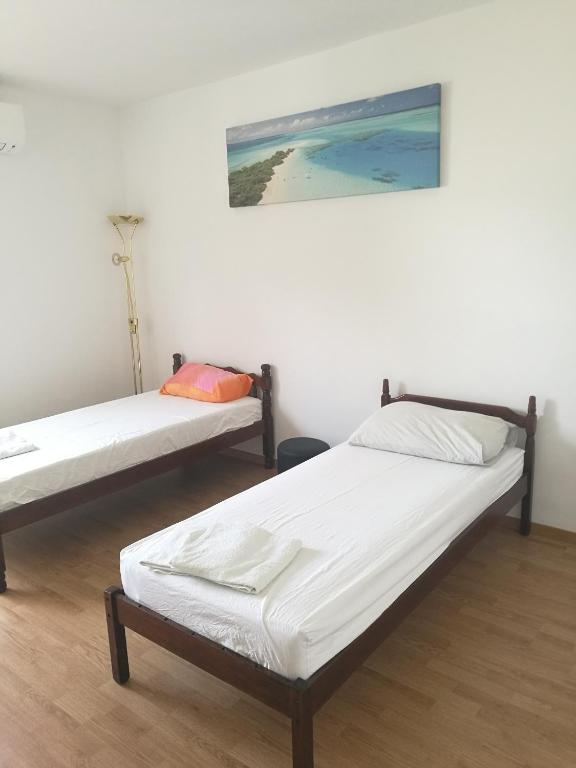 Posteľ alebo postele v izbe v ubytovaní Nice and cozy two single bed room
