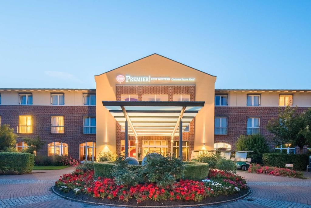 a rendering of the front of a hotel at Best Western Premier Castanea Resort Hotel in Lüneburg