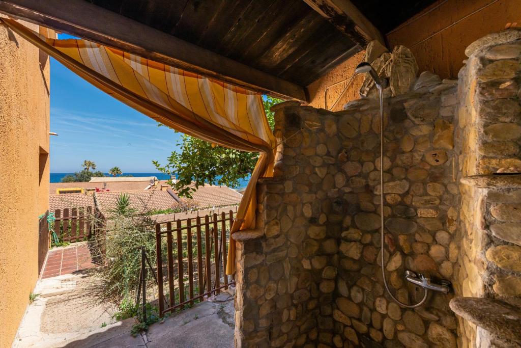 Balkon lub taras w obiekcie Villetta Residence Porto Corallo