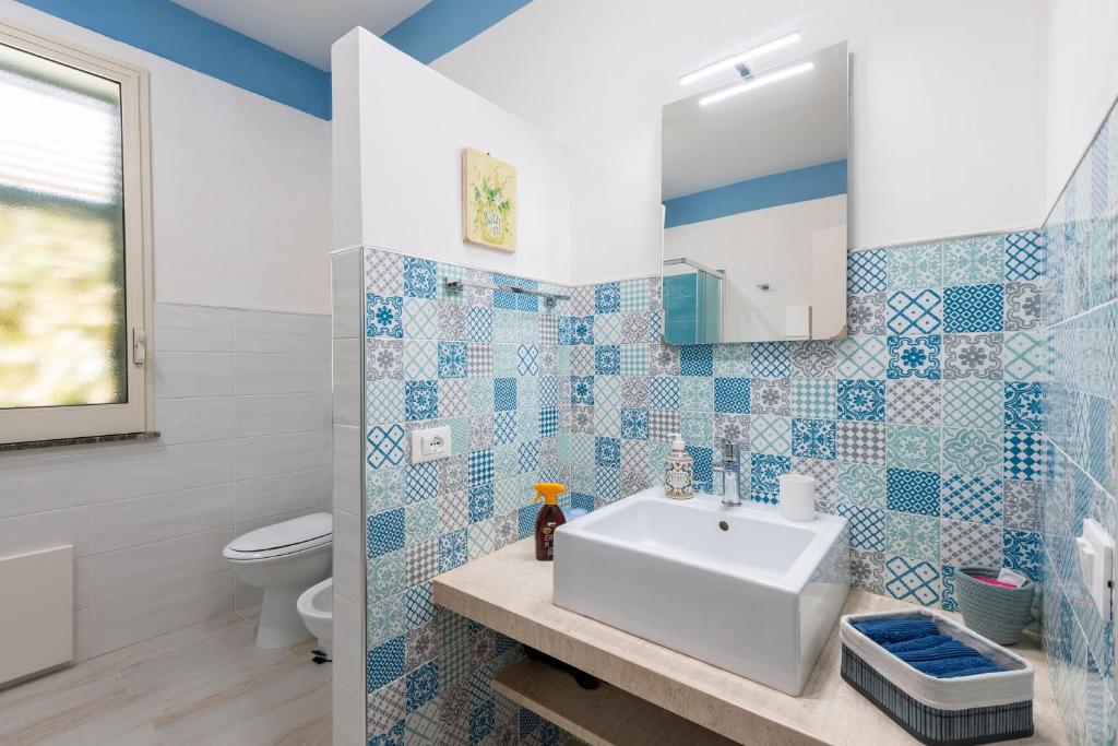 Łazienka w obiekcie Appartamento in Villa Tulipano