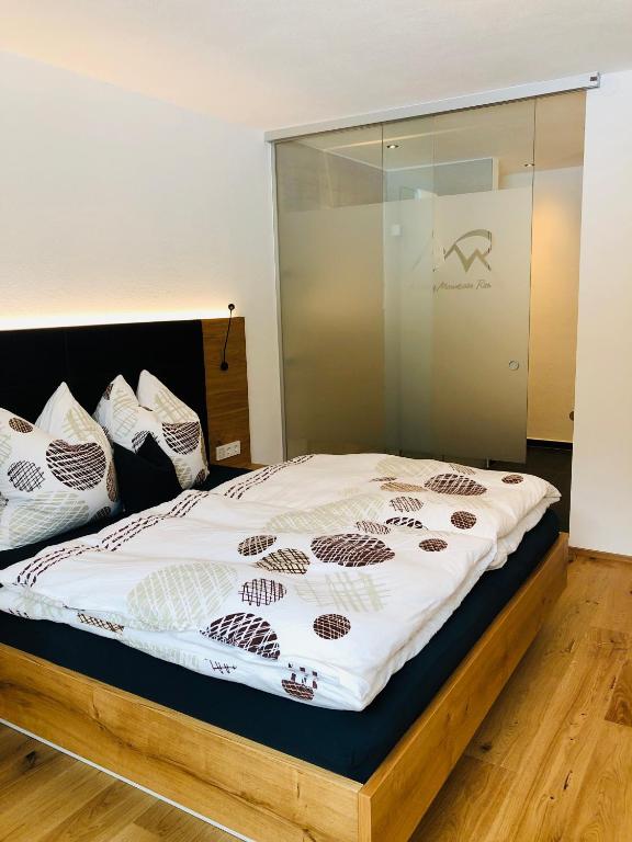 Posteľ alebo postele v izbe v ubytovaní Arlberg Mountain Resort
