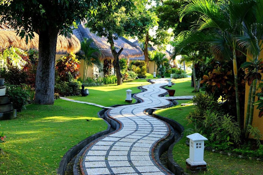 Zahrada ubytování Siddhartha Oceanfront Resort & Spa Bali