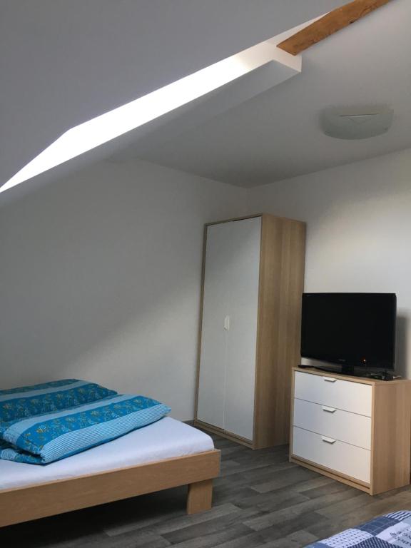 Postel nebo postele na pokoji v ubytování Chalupa a apartmány Morajda