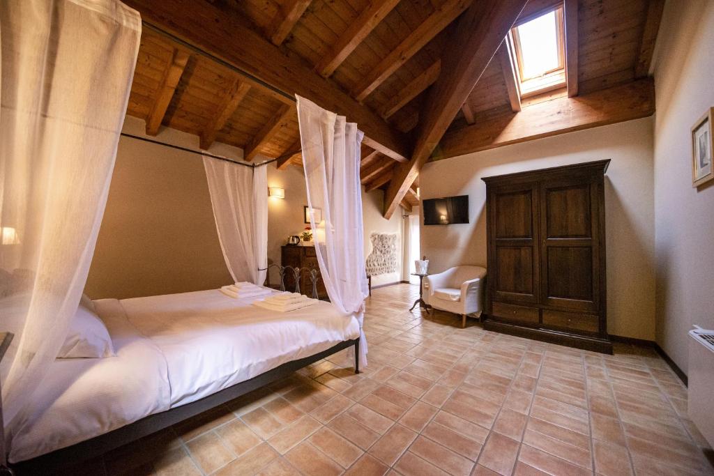 Postel nebo postele na pokoji v ubytování Villa dei Mulini