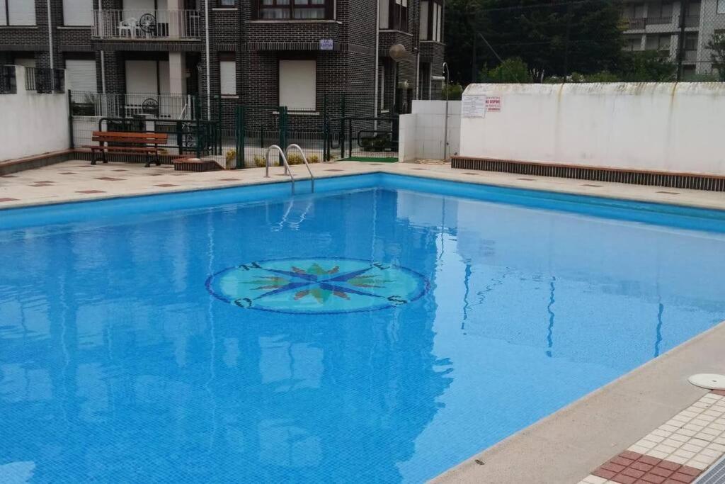 Bazén v ubytování piso en la playa nebo v jeho okolí
