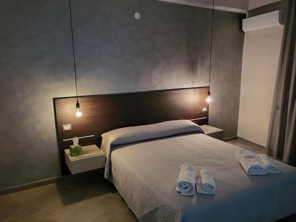 Postel nebo postele na pokoji v ubytování Casa dello stretto