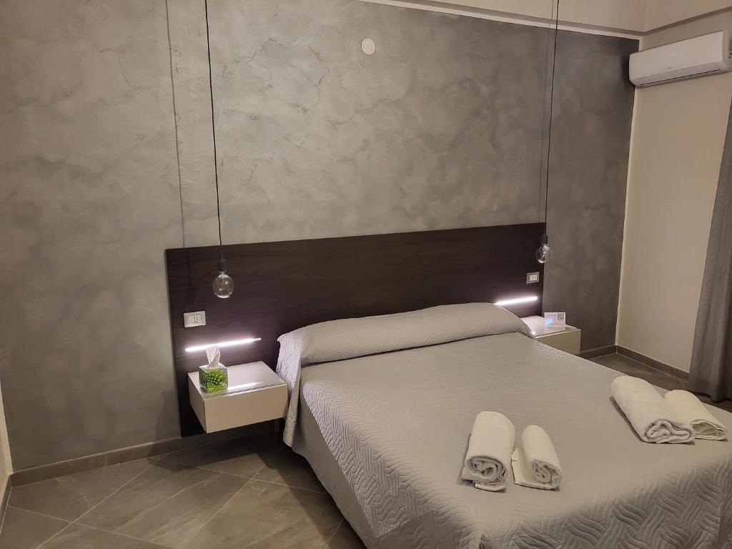 Postel nebo postele na pokoji v ubytování Casa dello stretto
