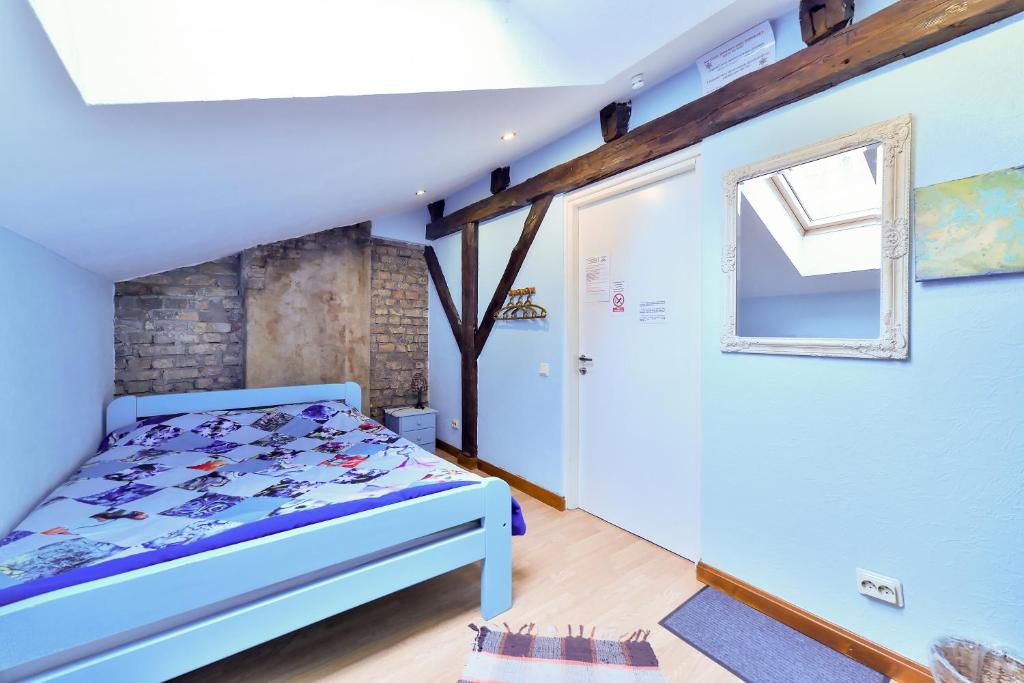 Postel nebo postele na pokoji v ubytování Central Hostel