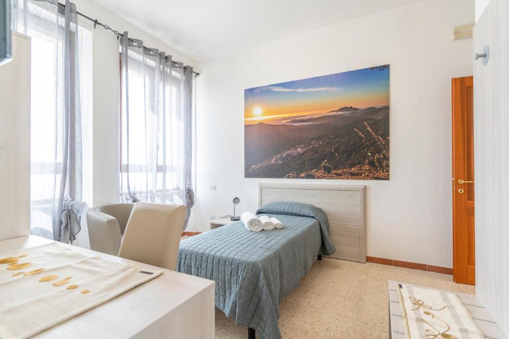Postel nebo postele na pokoji v ubytování Hotel dei Tacchi