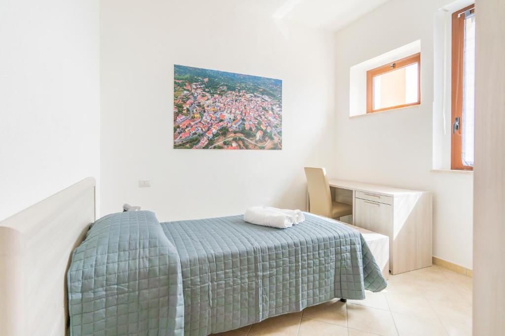 Postel nebo postele na pokoji v ubytování Hotel dei Tacchi