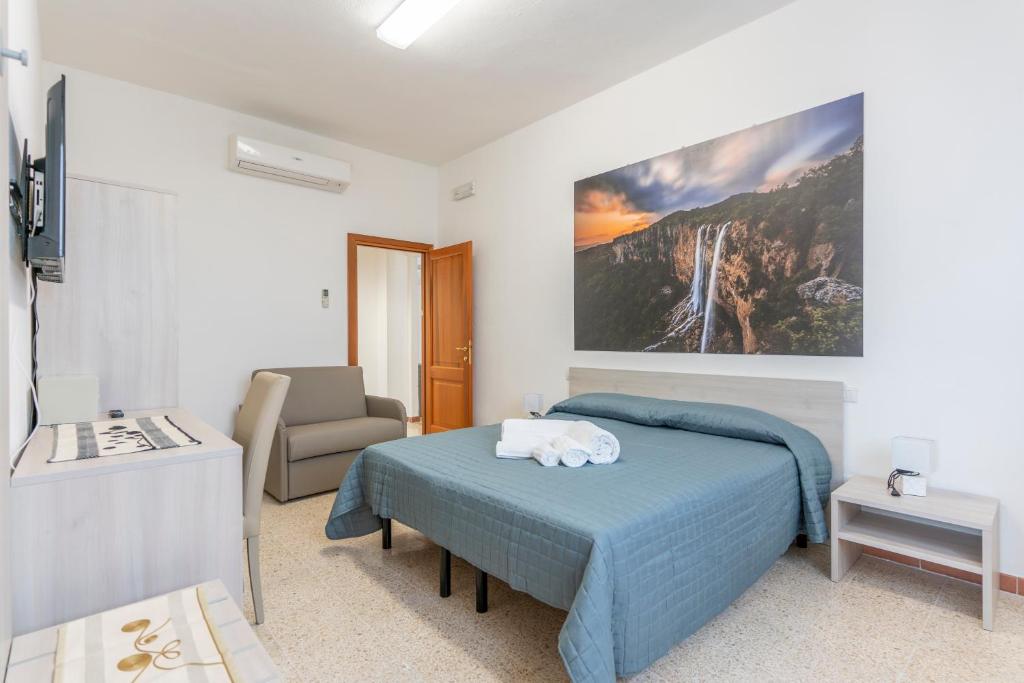 Postel nebo postele na pokoji v ubytování Hotel dei Tacchi