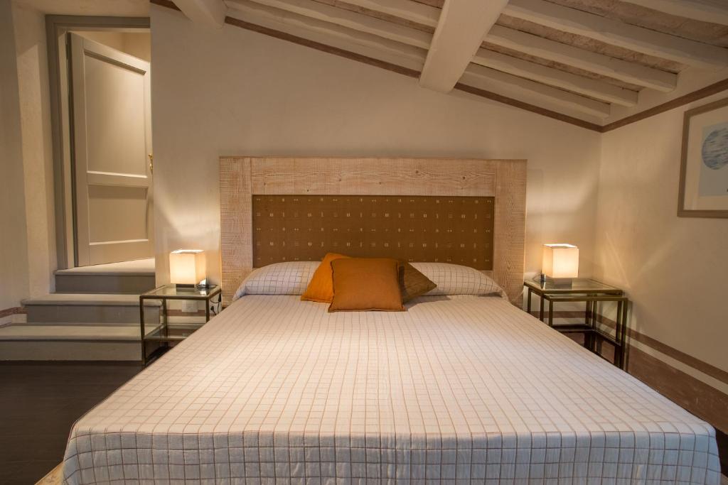 Posteľ alebo postele v izbe v ubytovaní La Dispensa-bio agriturismo