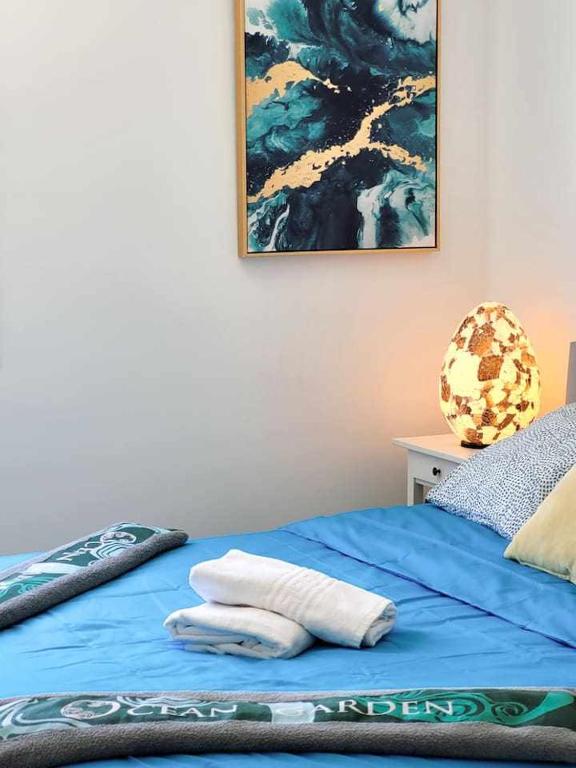Postel nebo postele na pokoji v ubytování Ocean Garden Suite El Sol
