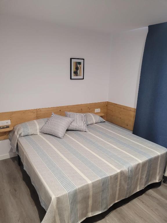 Postel nebo postele na pokoji v ubytování Malva Hostel Estartit