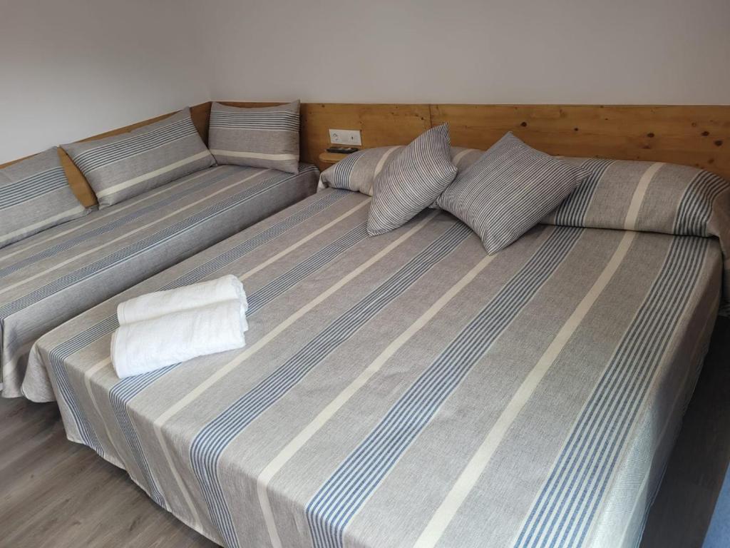 Postel nebo postele na pokoji v ubytování Malva Hostel Estartit