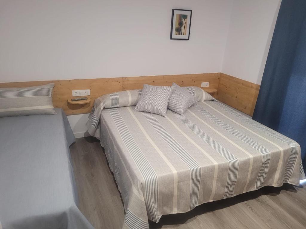 Postel nebo postele na pokoji v ubytování Malva Hostel Estartit