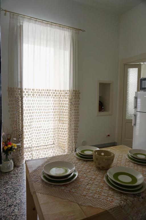 Kuchyňa alebo kuchynka v ubytovaní Terrazza Alma Bianca