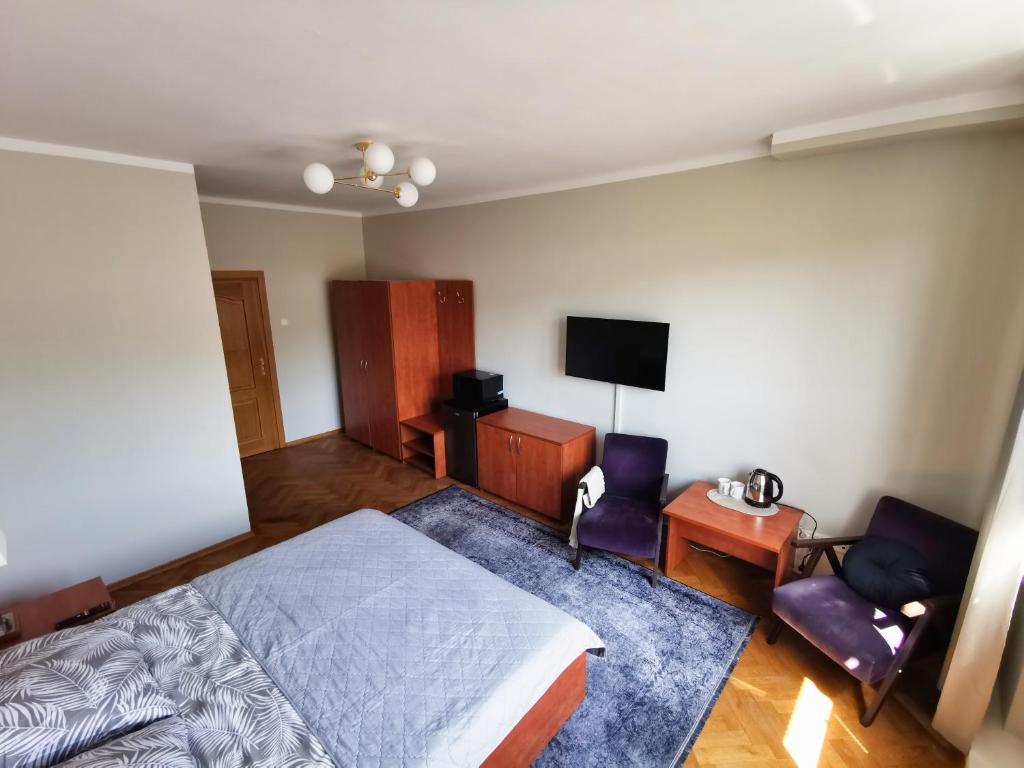Posteľ alebo postele v izbe v ubytovaní Studio Centrum Gdynia Świętojańska