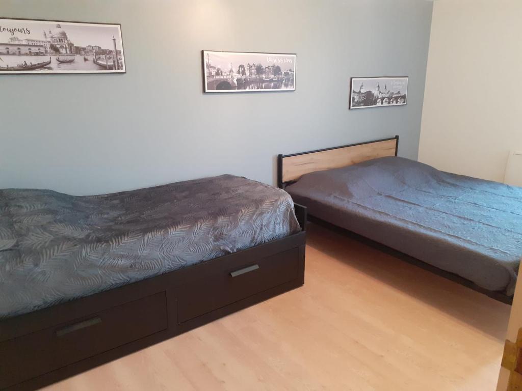 Posteľ alebo postele v izbe v ubytovaní Gite des falaises de Longues 8personnes