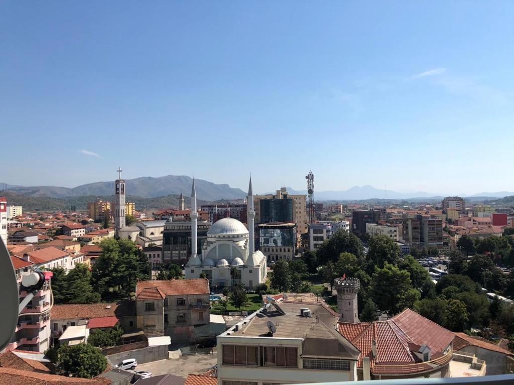 a view of a city with buildings and mosques at VIEW APARTMENT in Shkodër