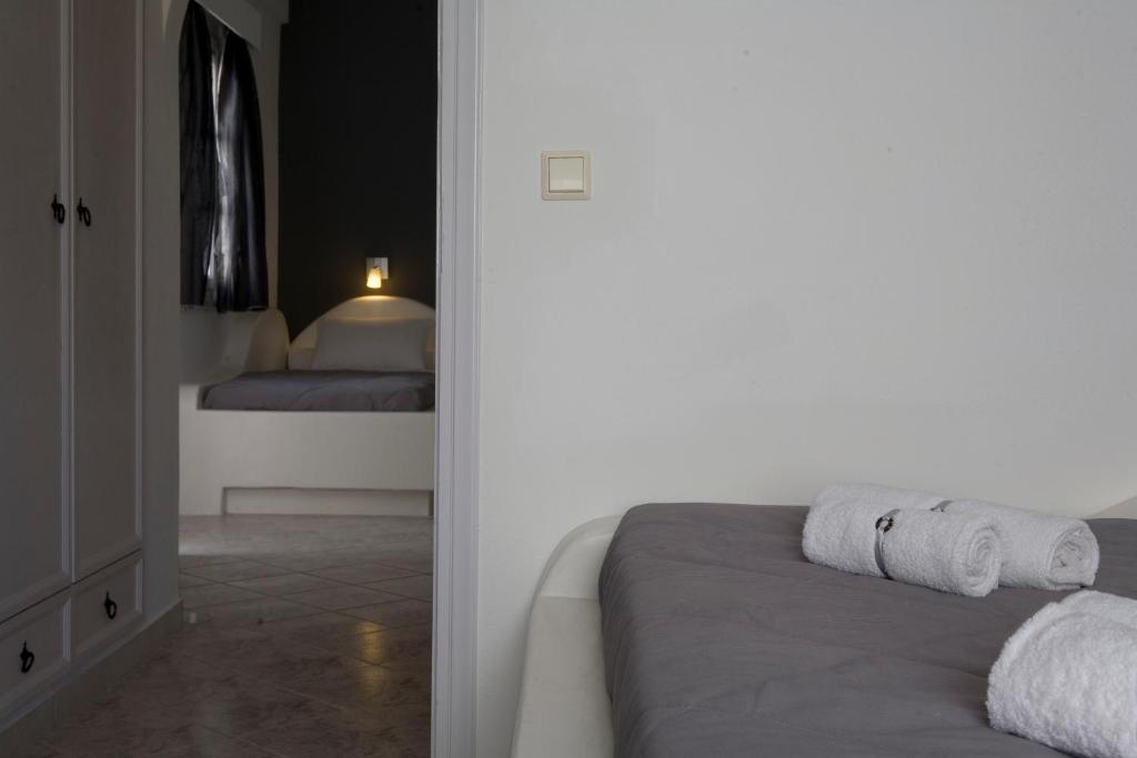 Postel nebo postele na pokoji v ubytování Philippion Boutique Hotel