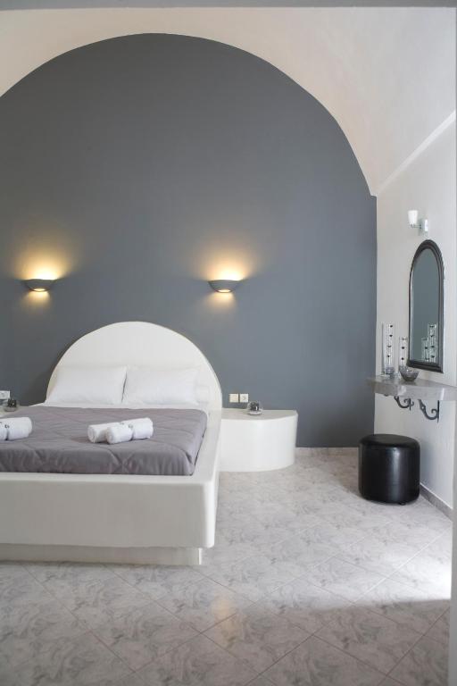 Postel nebo postele na pokoji v ubytování Philippion Boutique Hotel