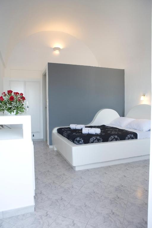Postel nebo postele na pokoji v ubytování Philippion Boutique Hotel