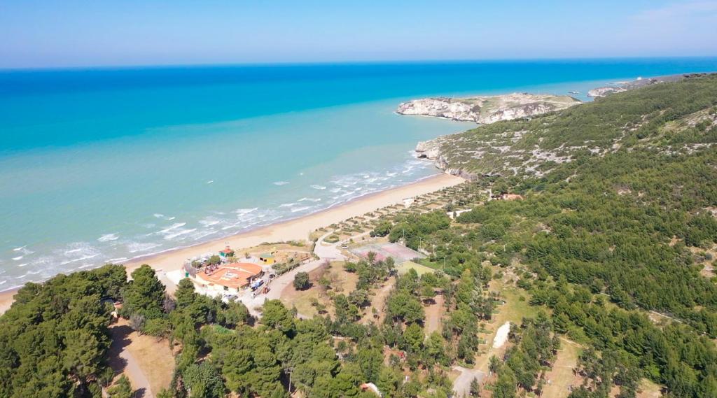 an aerial view of a beach with a house at Centro Turistico San Nicola in Peschici