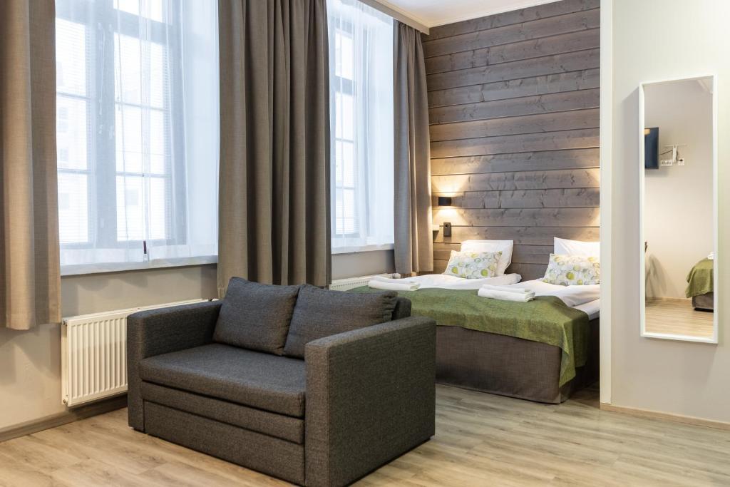 Posezení v ubytování Hotel Metsähirvas