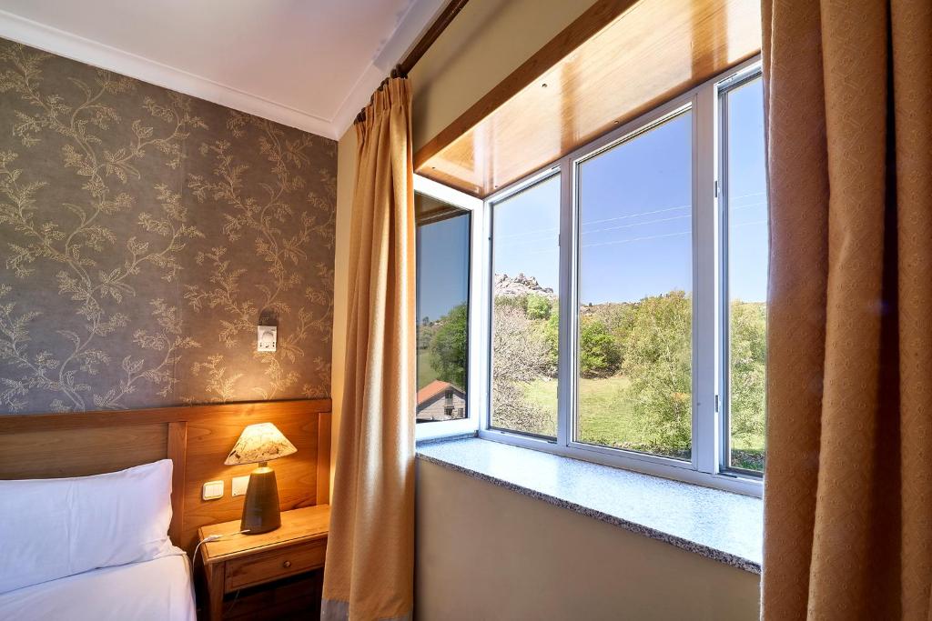 Postel nebo postele na pokoji v ubytování Hotel Castrum Villae by Walk Hotels