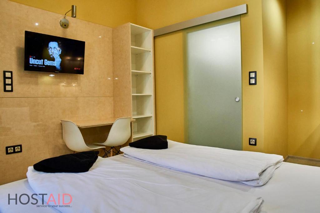 Posteľ alebo postele v izbe v ubytovaní A13 Apartments - Budapest - hostAID