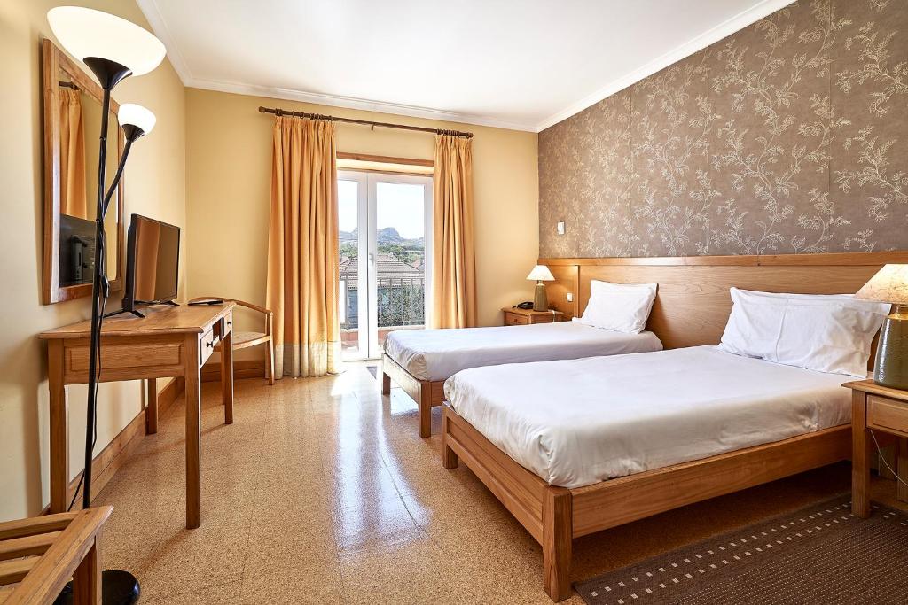 Postel nebo postele na pokoji v ubytování Hotel Castrum Villae by Walk Hotels