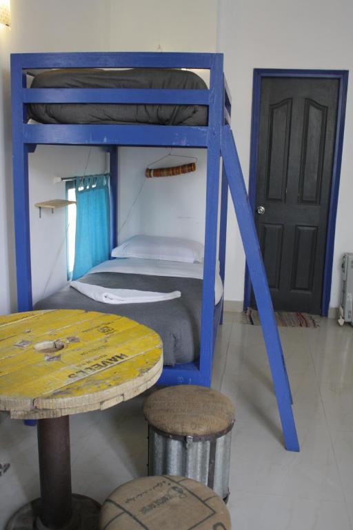 Palanda nebo palandy na pokoji v ubytování Bed & Chai Guesthouse