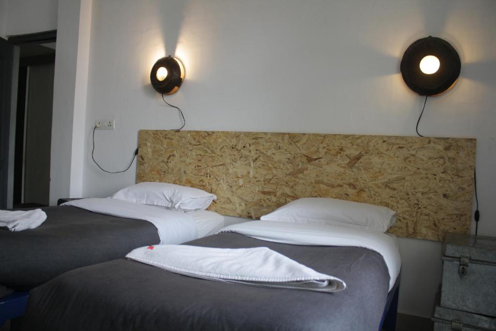 Postel nebo postele na pokoji v ubytování Bed & Chai Guesthouse