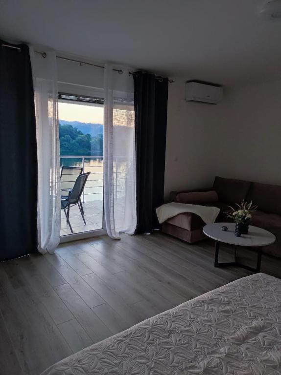 Letto o letti in una camera di Lago d'argento sobe