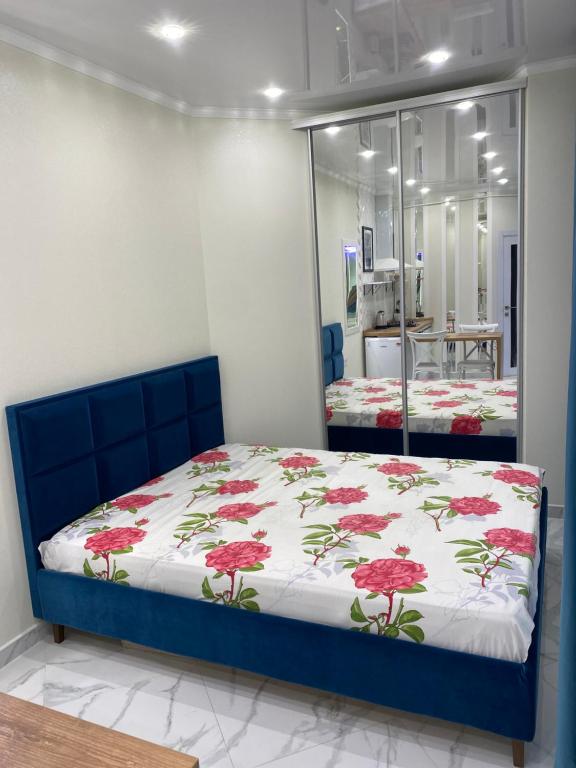 Ένα ή περισσότερα κρεβάτια σε δωμάτιο στο Deribasovskaya LUX