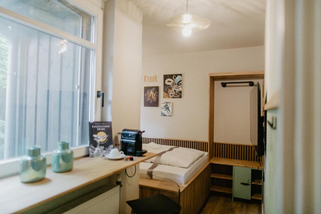 Postel nebo postele na pokoji v ubytování Peak Hotel & Event