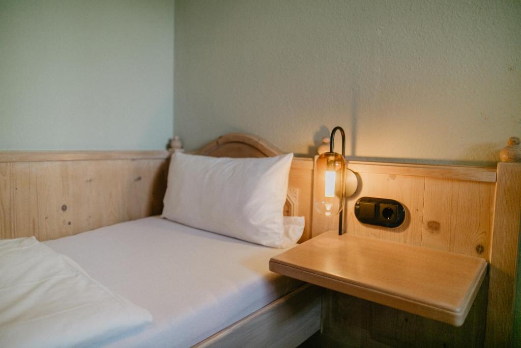Postel nebo postele na pokoji v ubytování Peak Hotel & Event