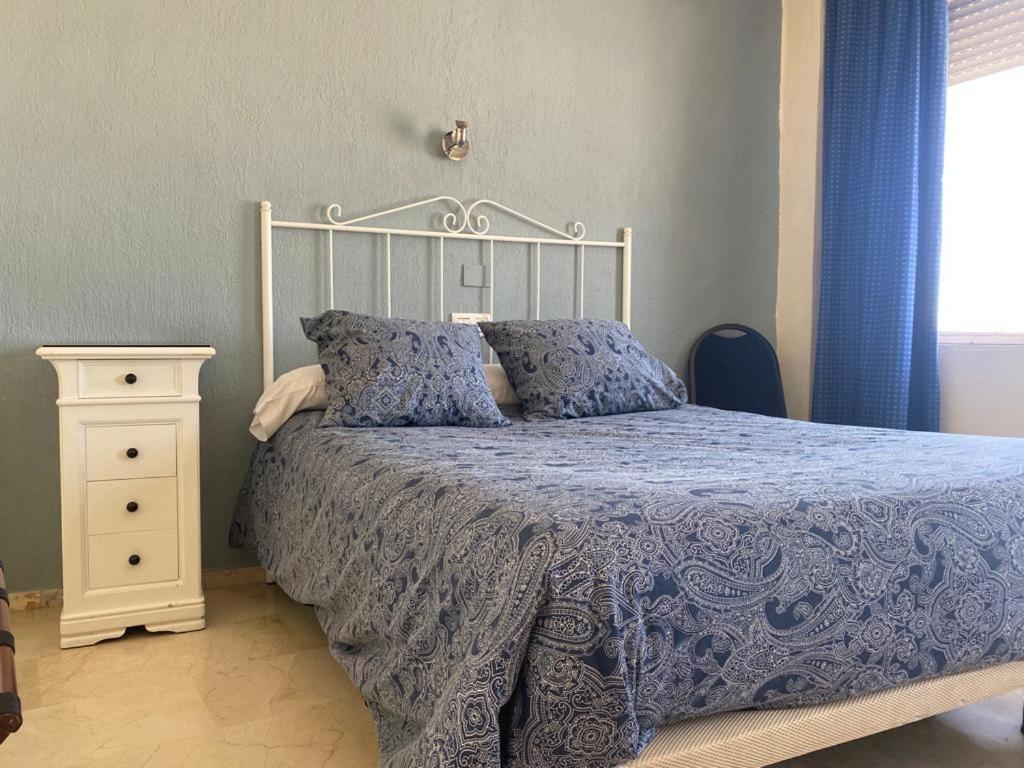 Postel nebo postele na pokoji v ubytování Hotel Medina Centro