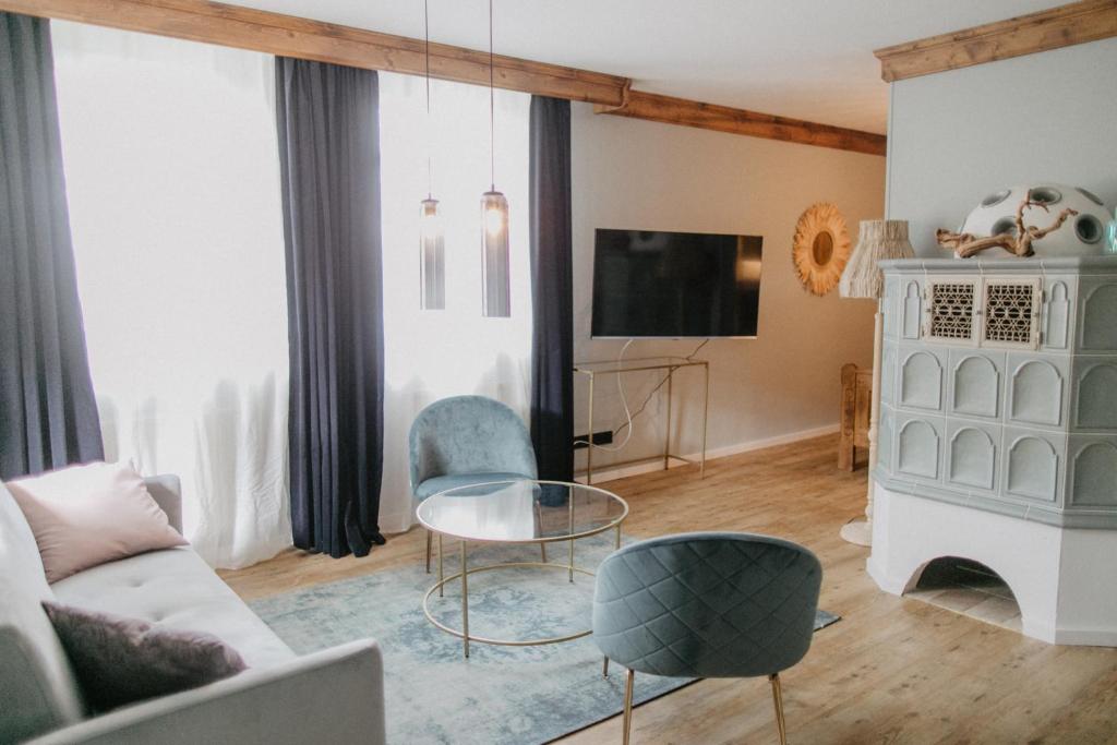 TV a/nebo společenská místnost v ubytování Peak Hotel & Event