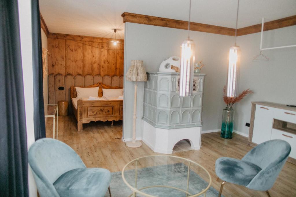 Postel nebo postele na pokoji v ubytování Peak Hotel & Event