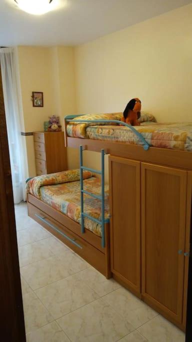 Postel nebo postele na pokoji v ubytování piso en la playa