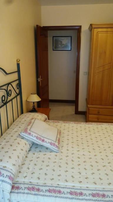 Postel nebo postele na pokoji v ubytování piso en la playa
