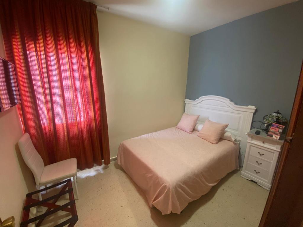 Postel nebo postele na pokoji v ubytování Hotel Medina Centro