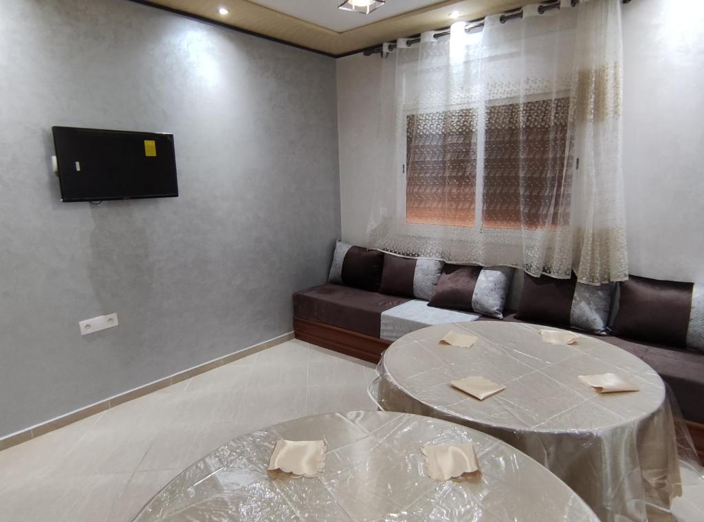 TV a/nebo společenská místnost v ubytování Appartments Achahbar