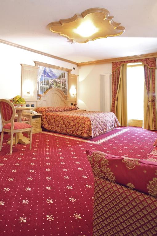 Postel nebo postele na pokoji v ubytování Hotel Almazzago