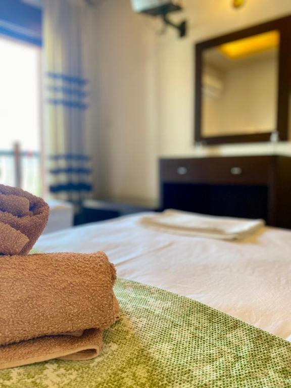 Postel nebo postele na pokoji v ubytování Hotel Alkionis